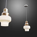 Modern Pendant Lights with White Shades and Gold Accents in Contemporary Design
