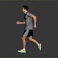Active Male Runner In Gray T Shirt Black Shorts And White Sneakers