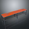 Modern Orange Bench With Metal Frame And Reflective Surface On Black Background