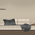 Poliform Beige Chaise Lounge With Grey Cushions Throw Blanket And Side Table