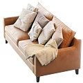 Brown Leather Sectional Sofa With Plush Patterned Pillows And Cozy Blanket 3d model