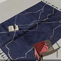 Blue Square Rug With White Patterned Lines And Tassels In Room With Chair And Books