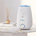 Modern Midea Humidifier with Reed Diffuser and Books on Marble Countertop 3d model