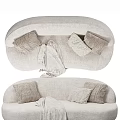 Comfortable Beige Lazy Sofa Design With Soft Plush Pillows And Cozy Blanket