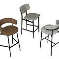 Modern Three Bar Stools With Different Colors Upholstered Seats And Metal Frames