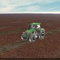 Scenic Green Cornfield Agricultural Landscape With Tractor Driving Through Rows And Background Trees