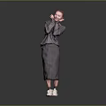 Woman in Gray Suit with Hands Near Cheeks and White Sneakers on Gradient Background