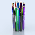 Vibrant Colored Pencils Arranged In Transparent Glass Cup On White Surface