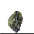 Scenic Canyon Landscape With River Flowing Through Moss Covered Rock Cliffs And Green Grass