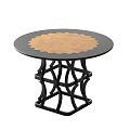 Round Dining Table with Black Border and Brown Patterned Top and Black Geometric Cut-out Legs