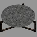 Modern Round Coffee Table With Textured Surface And Wooden Cross Legs