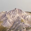 Natural Mountain Garden Landscape With Lush Green Grass And Rock Features