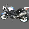 Blue And White Sport Motorcycle With Black Seat Silver Exhaust And Modern Body Design