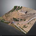 3D Model of Historic Building on Hillside With Surrounding Roads Trees and Green Areas