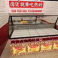 Restaurant Serving Hot Braised Food With Glass Display Case And Red White Tiled Walls