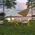 Outdoor Table with Metal Chairs White Canopy Grass Area Lake View Sunset Sky