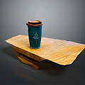 Green Coffee Cup With Brown Lid On Wooden Table Surface