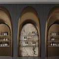 Gold Arched Wine Cabinet With Multi tiered Shelves Holding Wine Bottles And Glasses