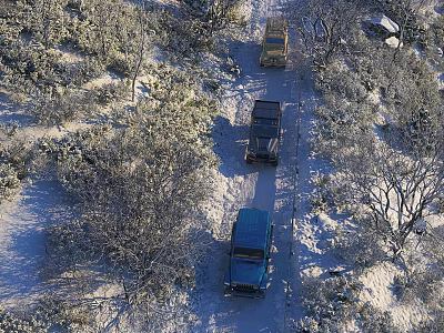 Stunning Snow Covered Winter Forest Scenery With Three Off Road Cars Parked On Narrow Trail 3d model