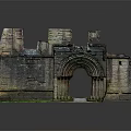 Ancient Stone Arched Entrance Gate of Castle Ruins with Green Grass