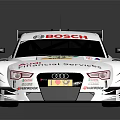 White Racing Car With Multiple Sponsor Logos And Rear Wing On Roof