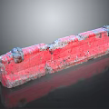 Weathered Red Brick With Chipped Surface And Metal Parts On Both Ends