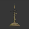 Vintage Brass Decorative Object with Tall Stem Ornate Base on Reflective Black Surface