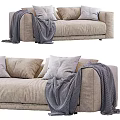 Cozy Beige Fabric Sectional Sofa With Soft Pillows And Knitted Throw Blanket