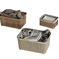 Three Woven Storage Baskets Filled with Clothes for Home Organization