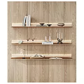 Stylish Modern Display Shelves On Wooden Wall With Layered Design And Decorative Items