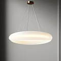 Modern White Circular Pendant Light with Thin Hanging Cords and Soft Illumination
