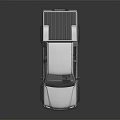 Toyota Silver Four Door Pickup Truck With Off Road Tires And Cab Bed