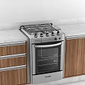 Modern Kitchen Gas Stove And Oven With Wooden Cabinets And Marble Countertop