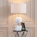 Elegant Table Lamp With White Lampshade Spherical Marble Base Silver Pole On Black Table