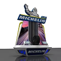 Michelin Display Stand Featuring Waving Michelin Man And Race Track Design