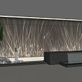 Modern Interior Wall Washer Light Illuminating Textured Wall With Green Plant And Stones
