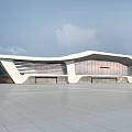 Modern Train Station Exterior With Wavy Roof Large Glass Windows And Spacious Square