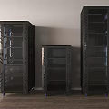Three Black Server Racks With Glass Doors And Wheels On Wooden Floor