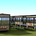 Commercial Food Trucks With Large Windows Benches And Tables On Grass With Blue Sky