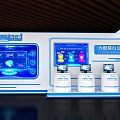 Other Tech Display Booth Featuring Blue Screens Interactive Interfaces White Podiums and Devices 3d model
