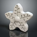White Snowflake Shaped Decorative Object With Hollow Patterns And Central Knob On Dark Surface 3d model