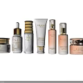 Luxury Beauty Cosmetics Collection With Gold Accents And Transparent Skincare Bottles
