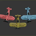 Colorful Toy Biplanes In Red Yellow Blue Arranged On Dark Background