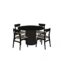 Round Black Dining Table with Ribbed Base and Four Modern Black Chairs with Beige Seats