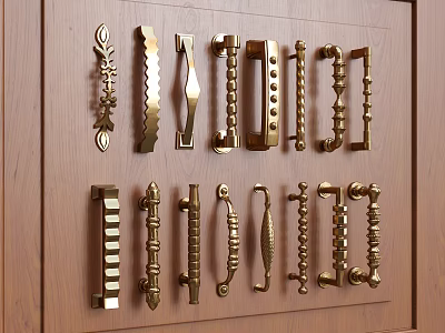 Collection Of Decorative Brass Cabinet Handles With Various Designs On Wooden Surface 3d model