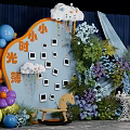 Decorative Photo Check In Spot With Clouds Photo Frames Colorful Balloons Greenery And Wooden Horse