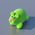 Green Pig Shaped Stuffed Toy With Pink Nose And Black Eyes Lying Down