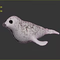 White Seal Figure With Brown Spots And Black Eyes On Smooth Surface