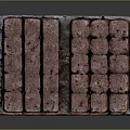 Wooden Pallet Stacked With Red And Gray Natural Stone Blocks