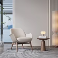 Beige Modern Armchair With Wooden Legs And Side Table With Table Lamp